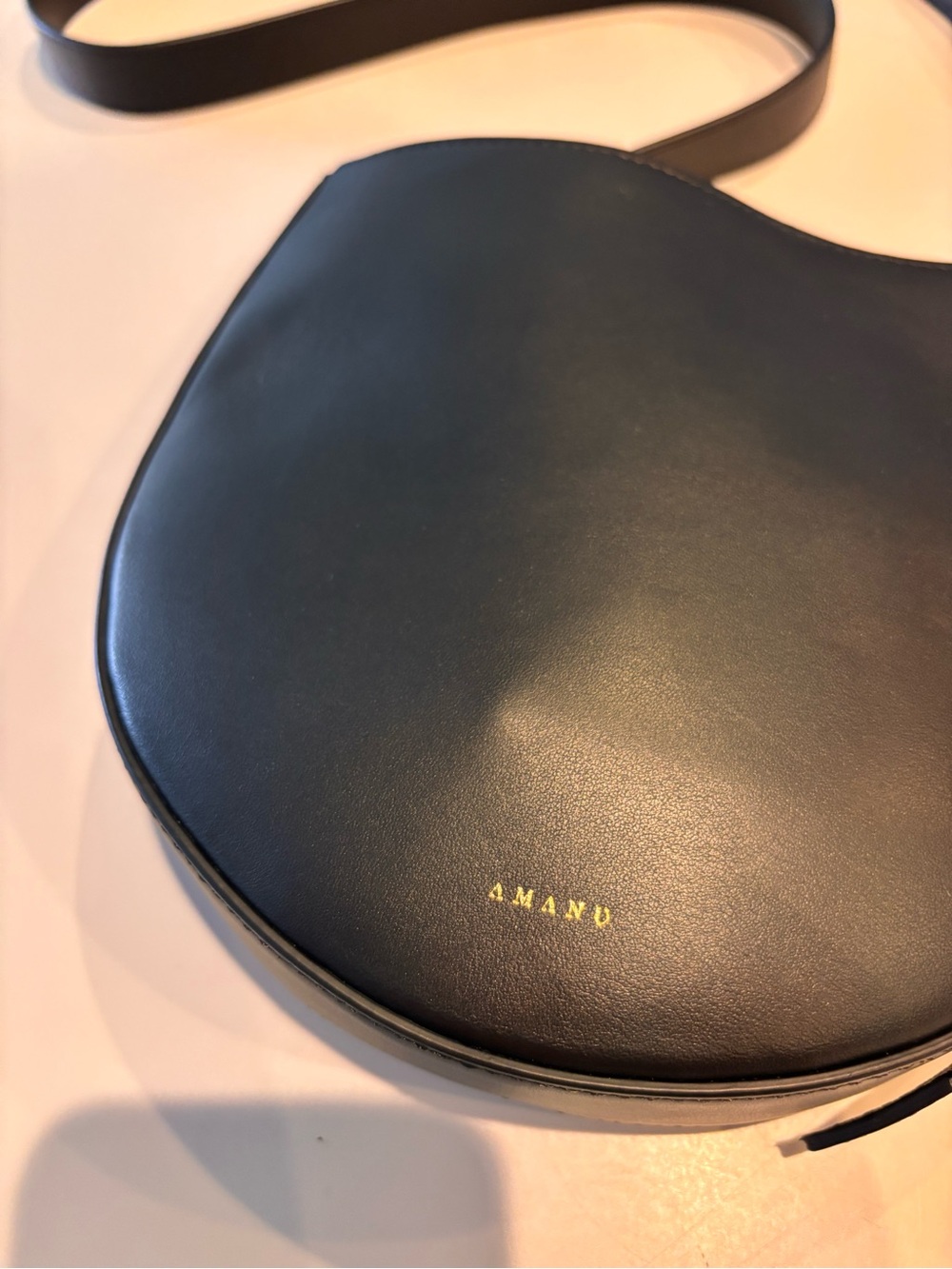 Black Half-Moon Leather Crossbody Bag with Gold Accents - Picture 5 of 6
